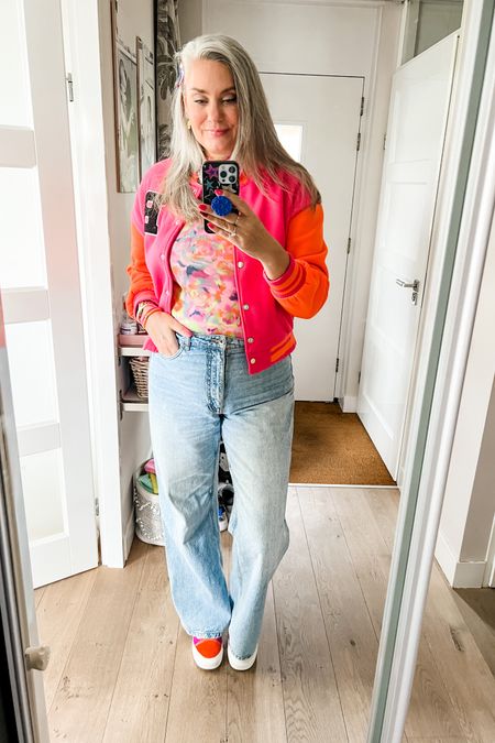 Ootd - King’s Day 👑🧡
Pink and orange cropped varsity jacket over a multicolored mesh top paired with wide legged jeans (old, Terstal) and pink and orange Vans. 



#LTKeurope #LTKstyletip #LTKFestival