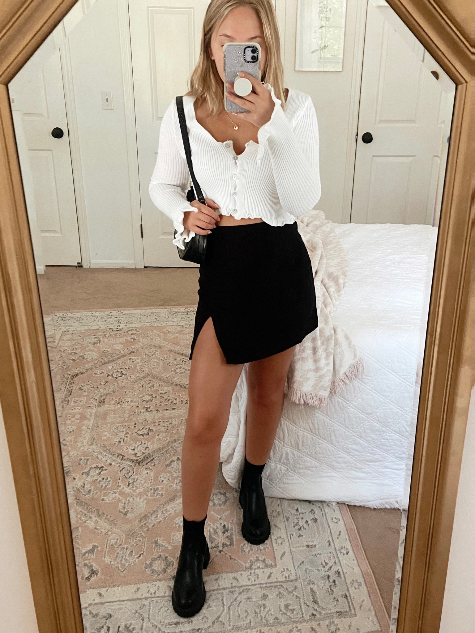 black mini skirt outfit

exact skirt is aritzia

#LTKsalealert #LTKstyletip #LTKunder100