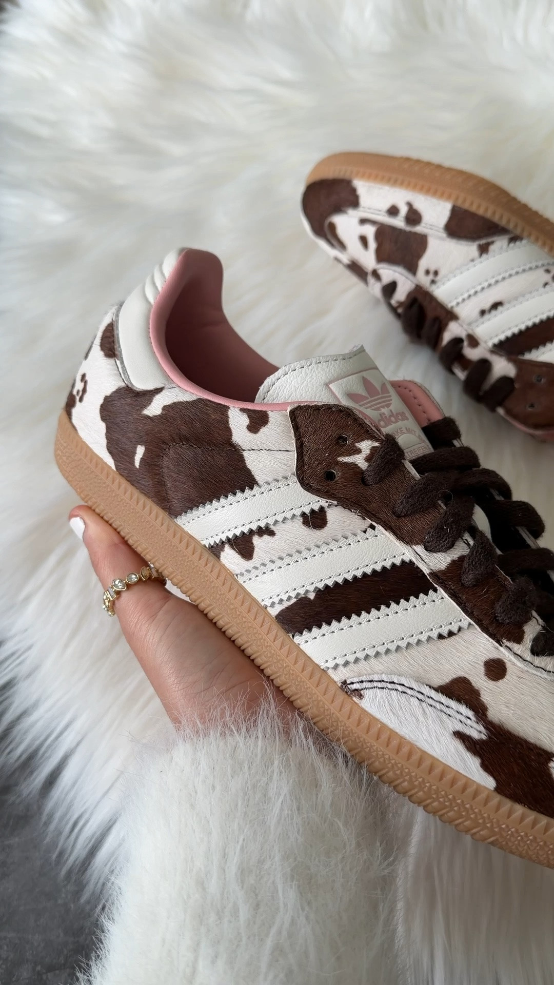 Now 40% off

adidas Samba OG – Cow Print 🐄🤎

These are such a fun twist on the classic Samba! The cow print pony hair paired with the brown details makes them the perfect statement sneaker while still being neutral enough to wear with denim, leggings, or your favorite matching set.

✨ Fit: They run true to size for most people. If you’re between sizes or have wider feet, I’d recommend going up a half size for the most comfortable fit.