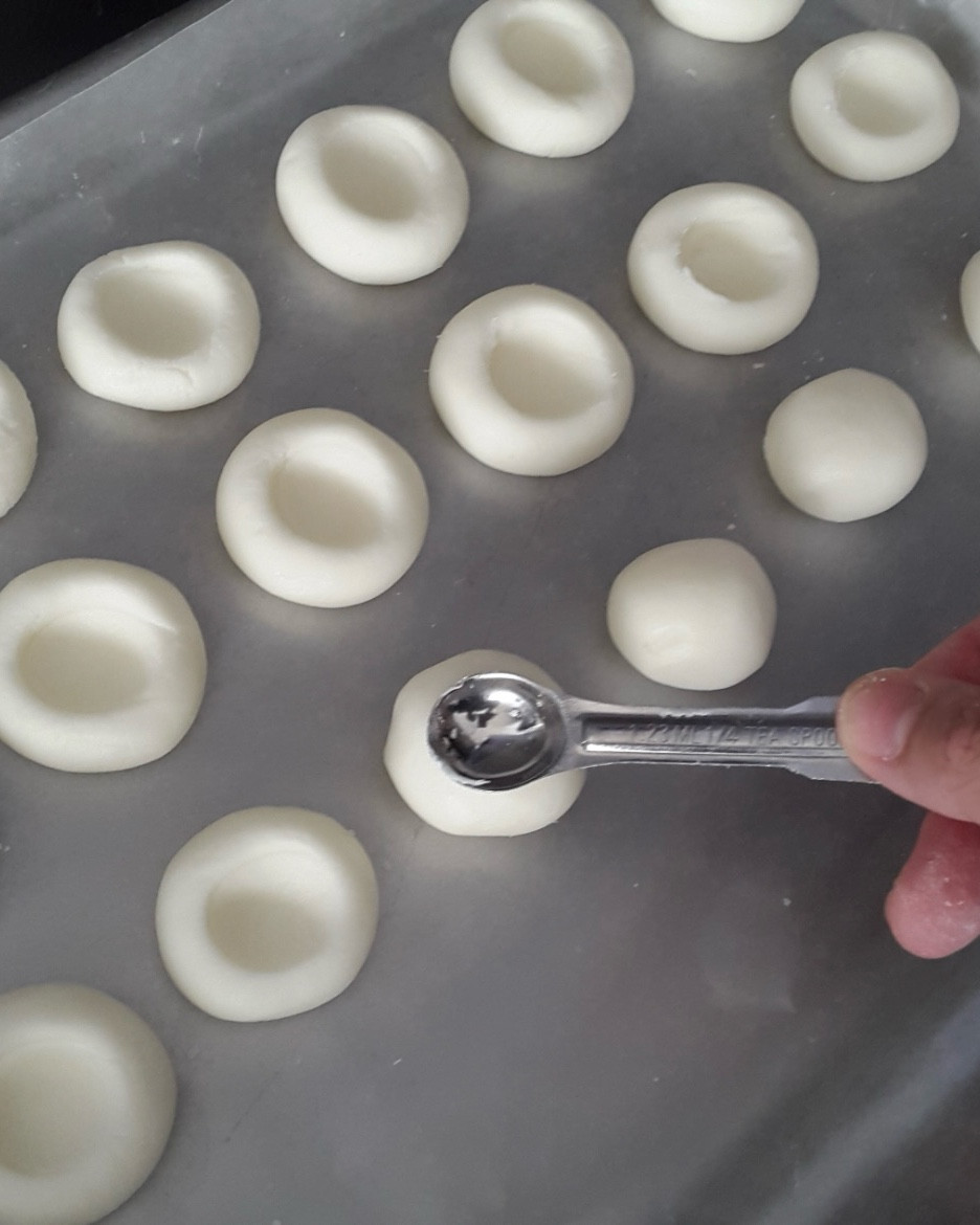 Chocolate Peppermints are so easy!

Ingredients
 1 pound confectioners sugar (powdered sugar)
 4 ounces, weight cream cheese, softened
 1/4 teaspoon peppermint extract
 6 ounces semi-sweet chocolate chips

Instructions
Using a mixer, gradually add the sugar to the cream cheese, beat well until incorporated.
Add peppermint extract and combine well.
Roll dough into teaspoon size balls and place on baking sheet(s) lined with wax paper or parchment. Create a small "bowl" or indention in each ball using a 1/4 teaspoon or your finger. Cover with plastic wrap and let firm up in refrigerator for a few hours.
When peppermints have firmed, melt chocolate according to package directions (microwave is fine). Fill a piping bag or freezer bag with the corner snipped with the melted chocolate. Fill each mini peppermint bowl/indention with chocolate and let cool.
Refrigerate in airtight container until ready to serve.

From She Wears Many Hats

#LTKHome #LTKHoliday #LTKfoodie