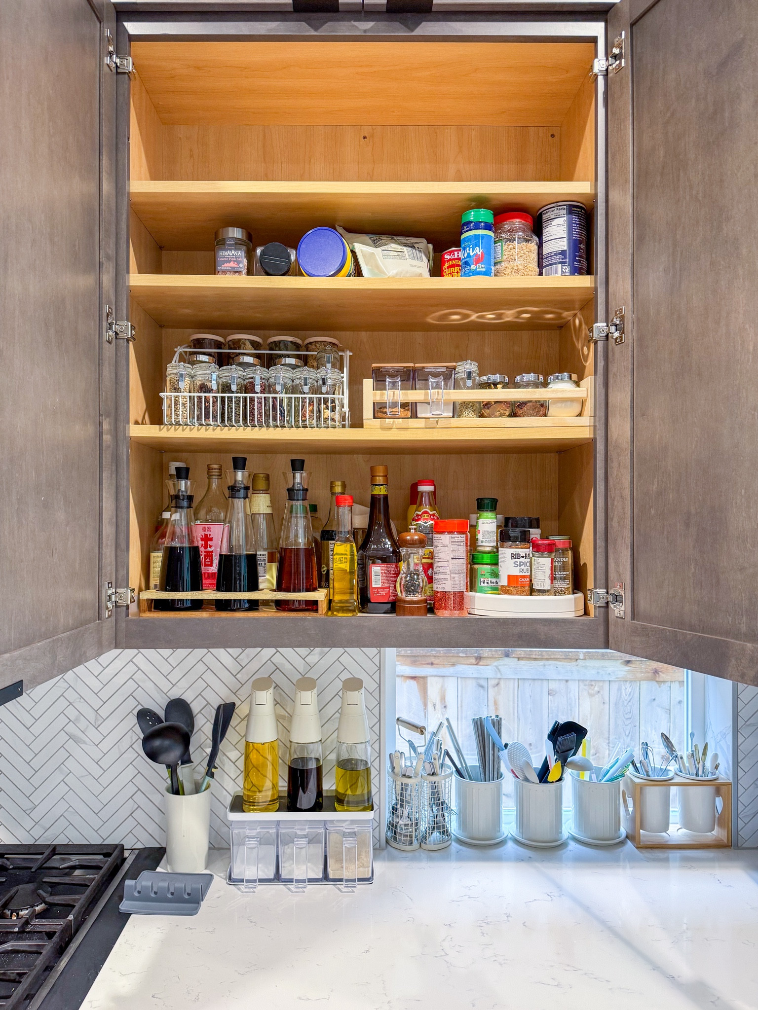The spice rack is out of stock right now so I linked similar items from Amazon and Temu, mine was the one from Container Store linked. The new one with plastic shelf looks more reasonable so that the bottles can be placed flat but mine doesn’t bother me 

#LTKHome
