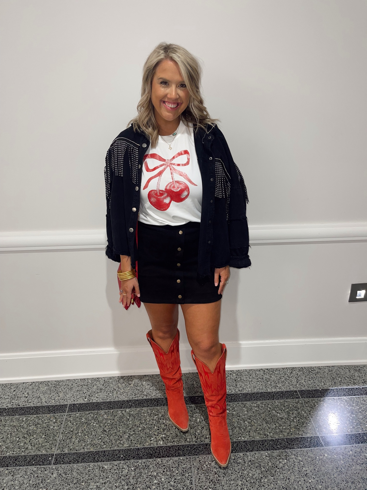 Pops of red 💋🍒🌹

Dingo red suede boots
Amazon snack miniskirt
Shein fringe jacket and cherry bow tee

#LTKSaleAlert #LTKShoeCrush #LTKStyleTip