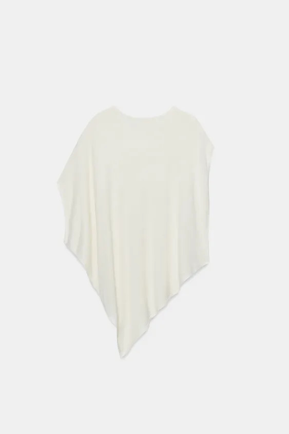 Flowy round neck top. Asymmetric sleeves and hem. | Zara US