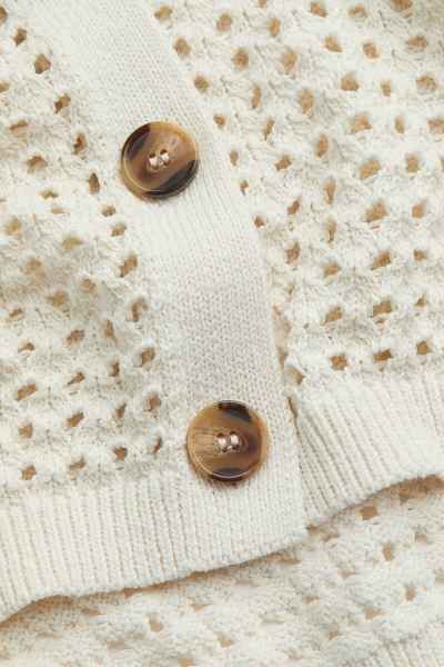 Classic, knit cardigan with a crocheted look. Collar, buttons at front, dropped shoulders, and lo... | H&M (US + CA)