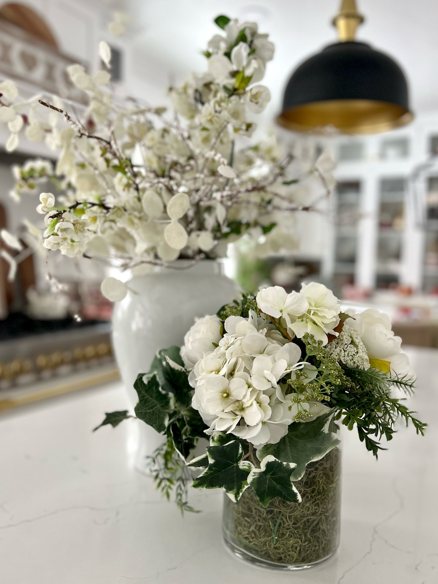 I love creating lovely white floral arrangements for my home the end of winter and early spring. A nice combination of textures and interest to your tablescape 

#LTKunder50 #LTKSeasonal #LTKhome