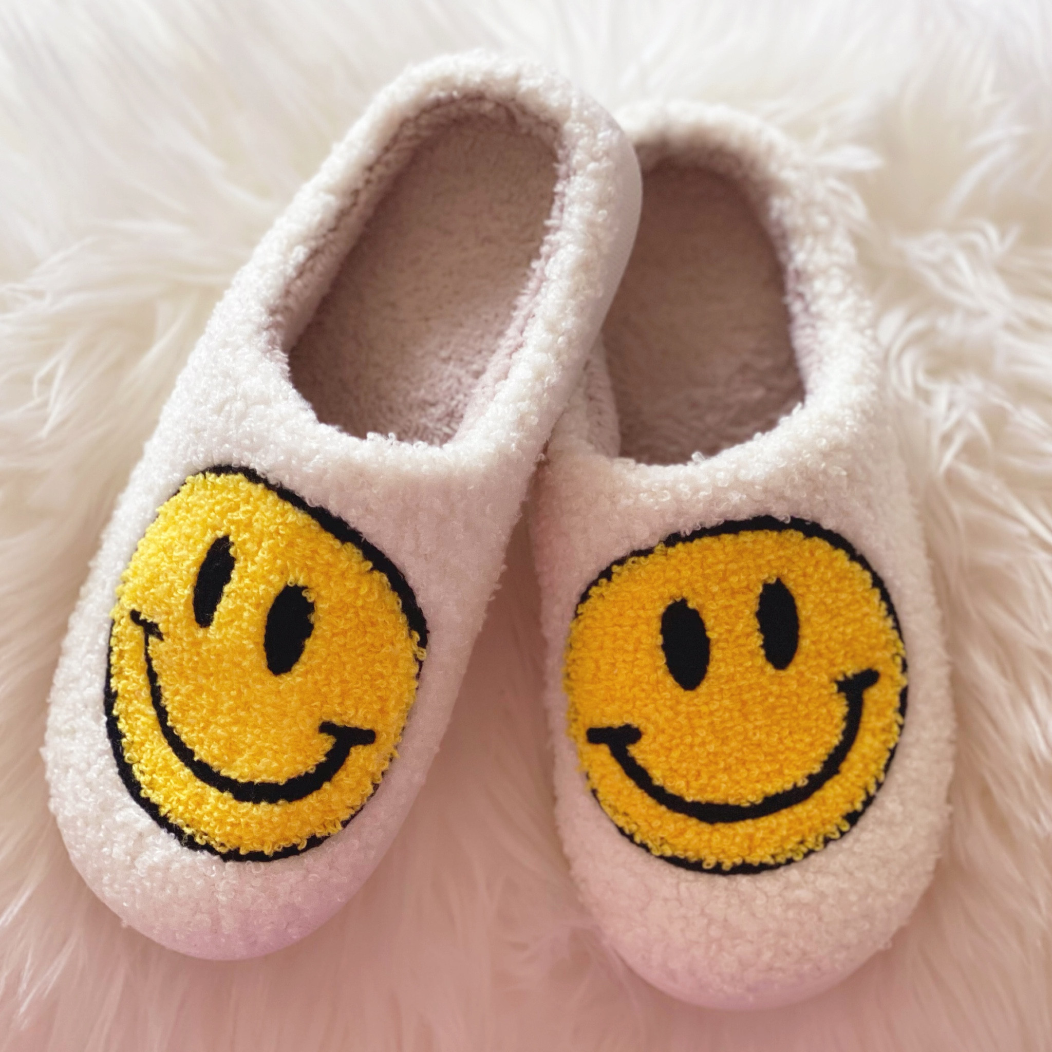Walmart smiley face slippers! Cute and incredibly comfortable!! Comes in so many colors!! 🙂

#LTKFind #LTKstyletip #LTKU