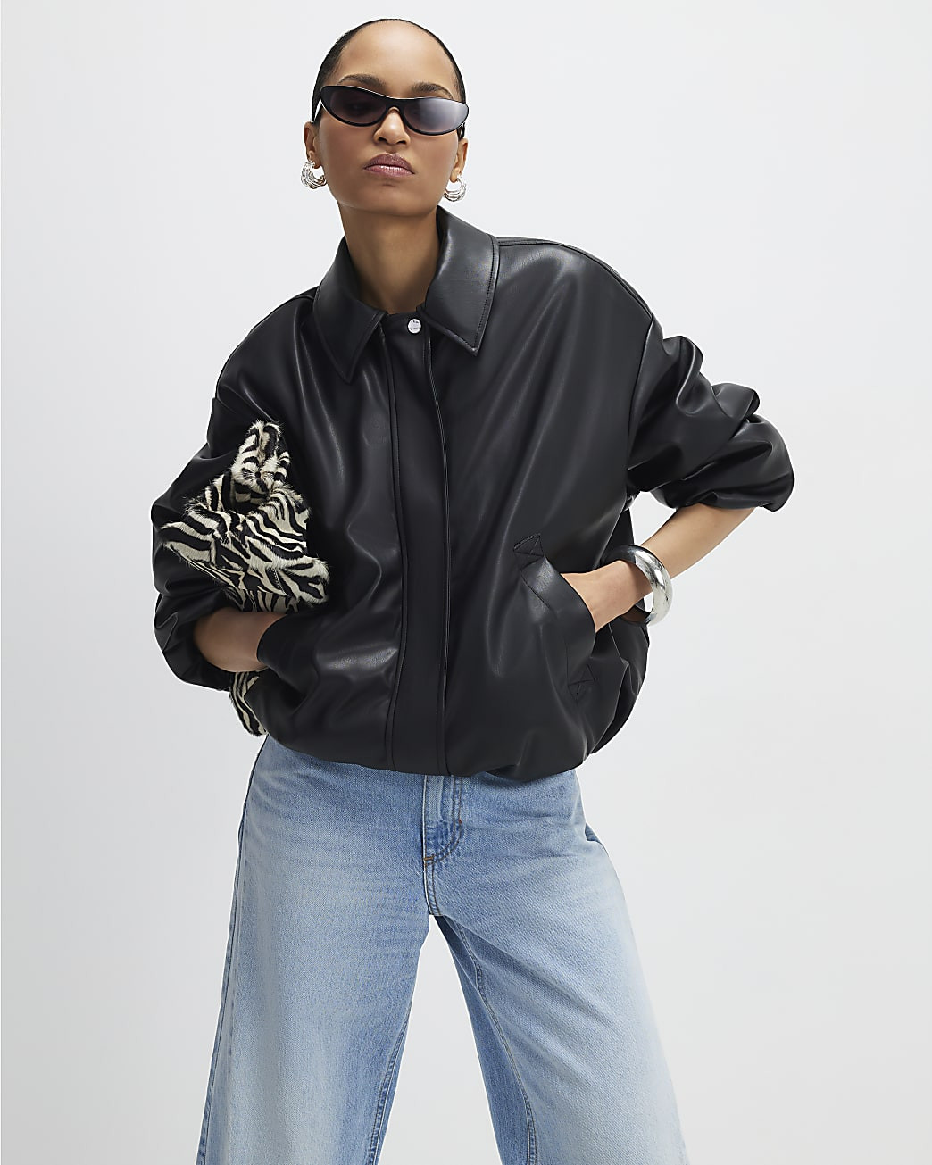 Black Faux Leather Bubble Hem Bomber Jacket | River Island UK & IE