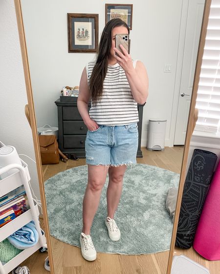 Spring outfit / summer fashion / distressed jean shorts / denim shorts / striped sleeveless top / white sneakers / vacation outfit / petite casual

#LTKfindsunder50 #LTKfindsunder100 #LTKSeasonal