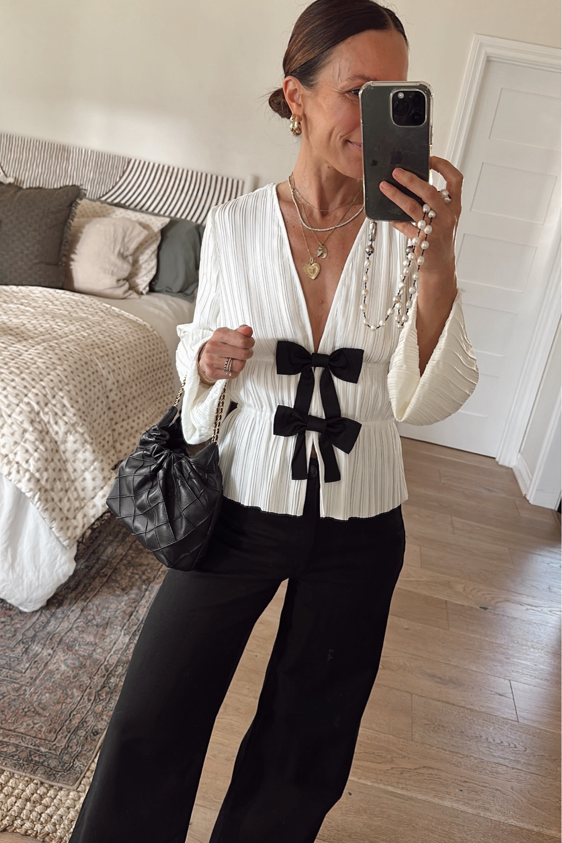 Little holiday bow top is 25% off 
Runs tts for me 

#LTKHoliday #LTKOver40