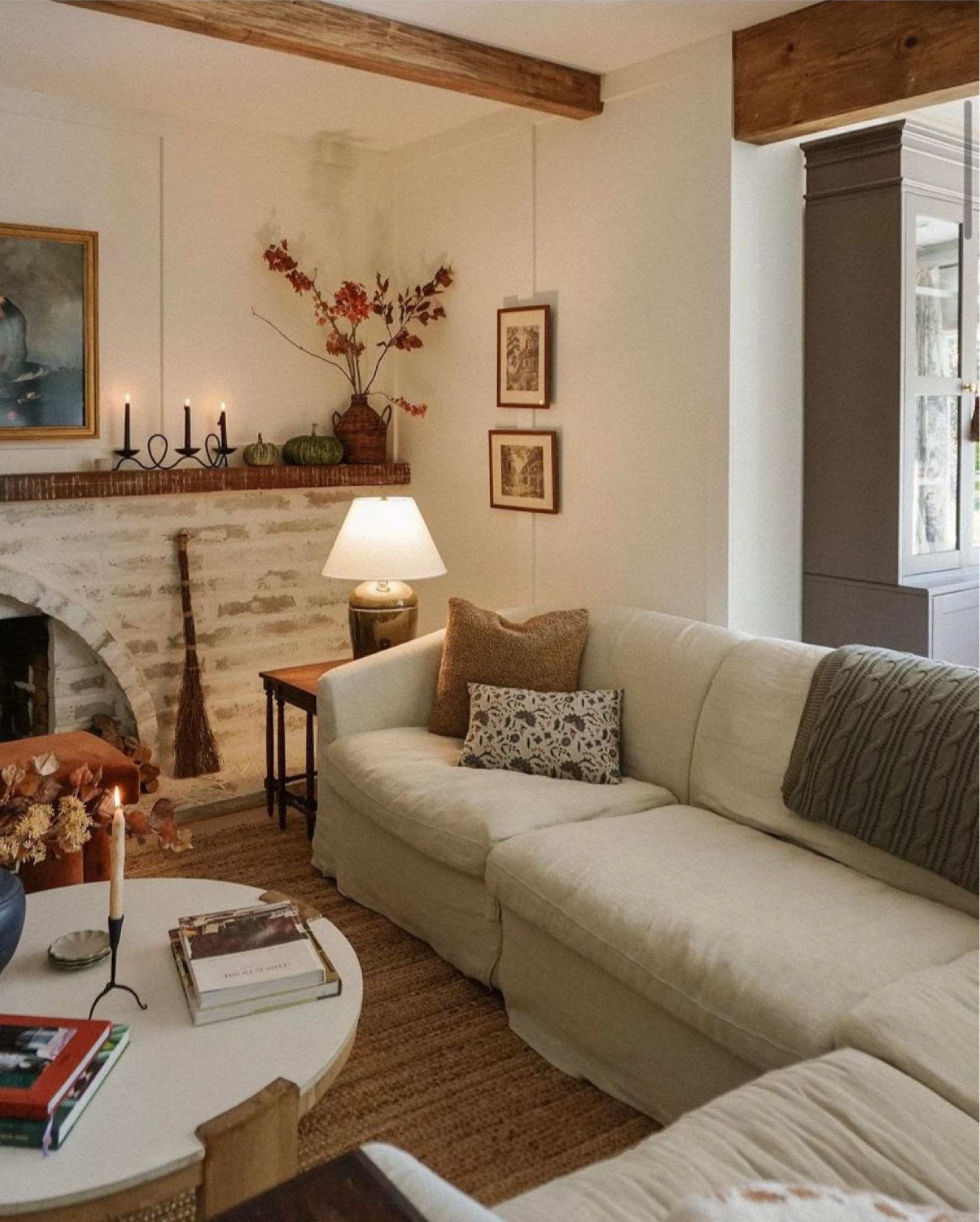 Details from this view 
-
Home decor. Throw blanket. Living room decor. Fall decor. Candle Holder. Coffee table. Table lamp. 

#LTKhome #LTKfindsunder50 #LTKSeasonal