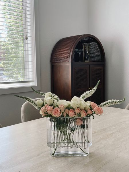 Summer floral arrangement with my new bar cabinet and vintage travertine dining table ✨

Target finds/Spanish inspired decor/ribbed vase 

#LTKstyletip #LTKhome #LTKsalealert