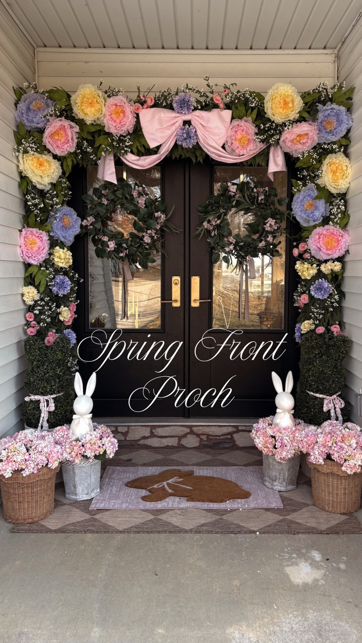 Spring Front Porch 2026
I am in love with how this turned out this year! The giant flowers are my favorite, along with the giant pink gingham bow! A lot of my flowers are from hobby lobby but I linked a lot of similar ones!
#frontporch #frontporchdecor #springporch #springdecor #springporch #easterdecor #homedecor #diydecor #diyspringdecor


#LTKSeasonal #LTKOver40 #LTKHome