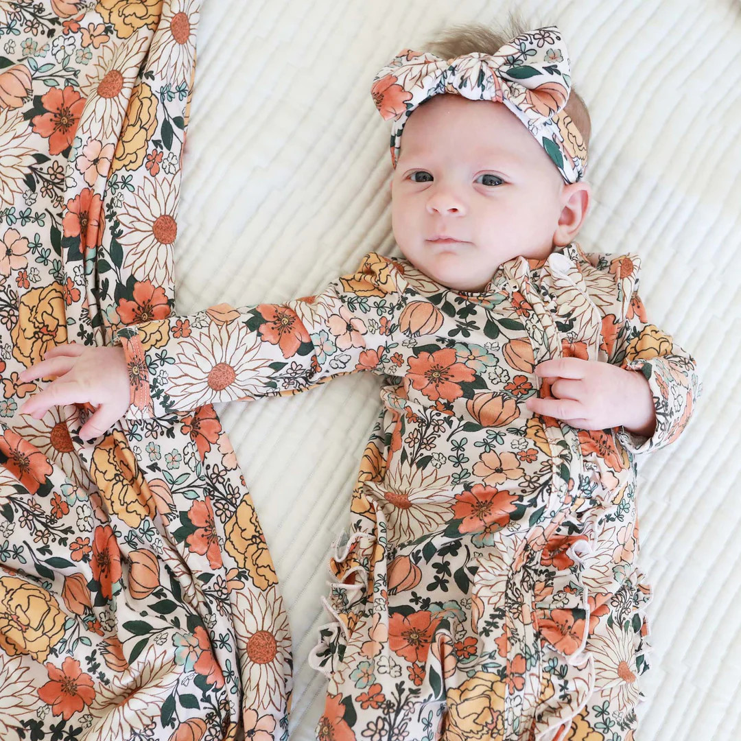 Stevie's Sunset Floral Ruffle Zipper Footie | Caden Lane