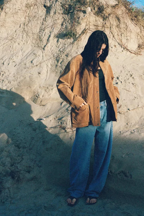 Jacket made of 100% suede leather. Contrast lapel collar in the same fabric. Long sleeves with bu... | Zara UK