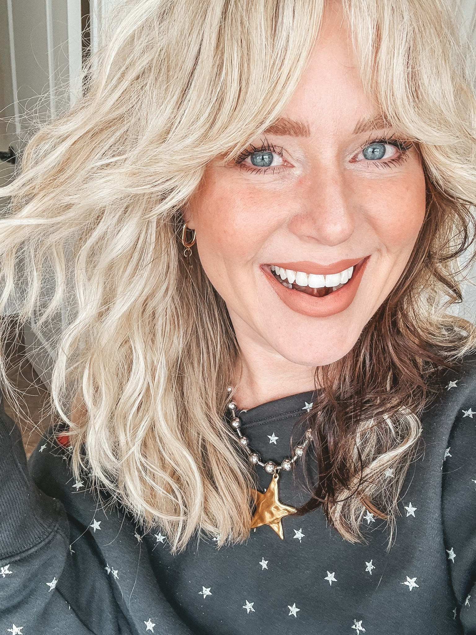 This sweatshirt is adorable. It also has matching sweatpants. I’m in a medium in both. 
My star necklace you can save with code MANDIE

#LTKOver40 #LTKootd
