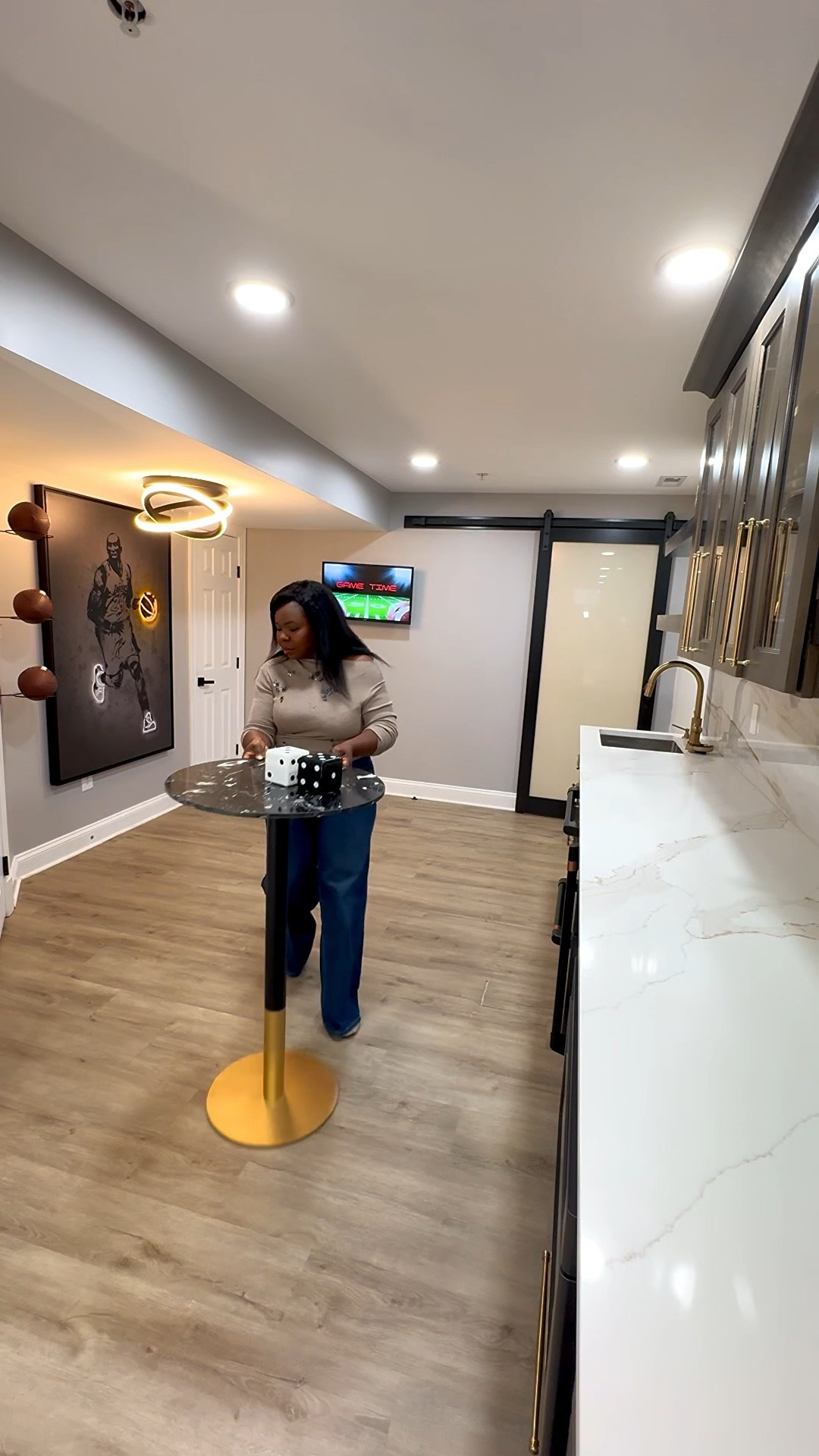 football i don’t know but decor i KNOW 😂🏈 so i swapped the basketballs on the wall for football and styled our favorite family hangout for game day. most of the pieces here i’ve had for a while from @wayfair, i just added a few simple touches to spruce things up. it’s honestly hard to get my kids and hubby 😅 out of this space. if you’re looking for practical, affordable ways to refresh your home, wayfair always comes through. #wayfairpartner #ad #BigGameHosting

#LTKSaleAlert #LTKSeasonal #LTKHome