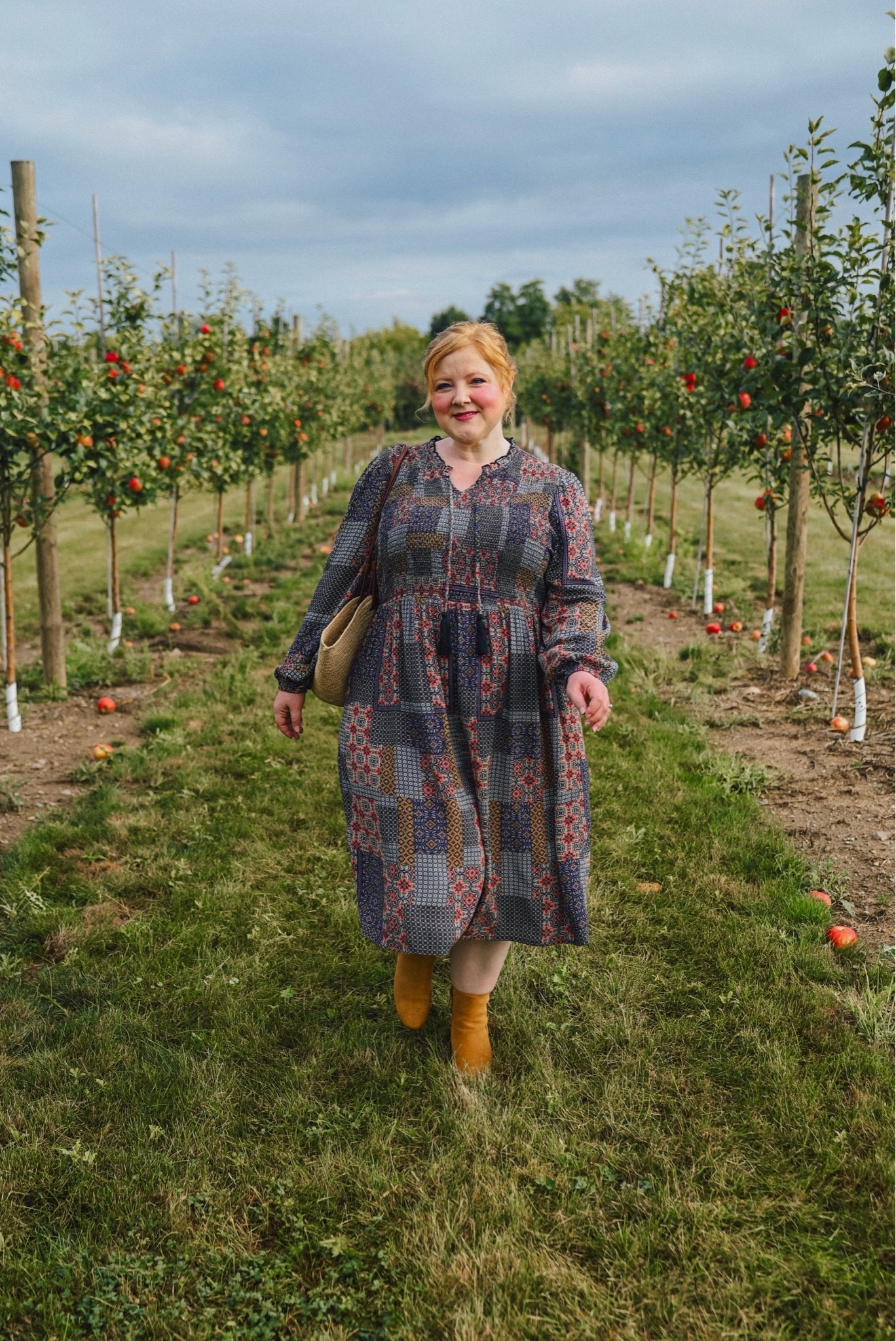 Apple picking in the 🍁🍎 prettiest fall dress 🍎🍁 from @ullapopkenusa! I’m wearing the size 16/18, and it’s available in sizes 12-34W. The top is stretchy and smocked, the sleeve cuffs are elasticized, and the fabric is a lightweight and easy-wear viscose. I love to live in dresses like this come fall. They look great with an ankle bootie and denim jacket for a look that can take you from day to night. Originally priced at $89.95, this dress is just $58 with my 35% OFF code WWWULLA!

#LTKootd #LTKPlusSize #LTKBump