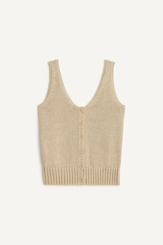 Vest top crafted in a cotton blend yarn. Featuring a round neckline and wide straps. Front button... | Zara UK