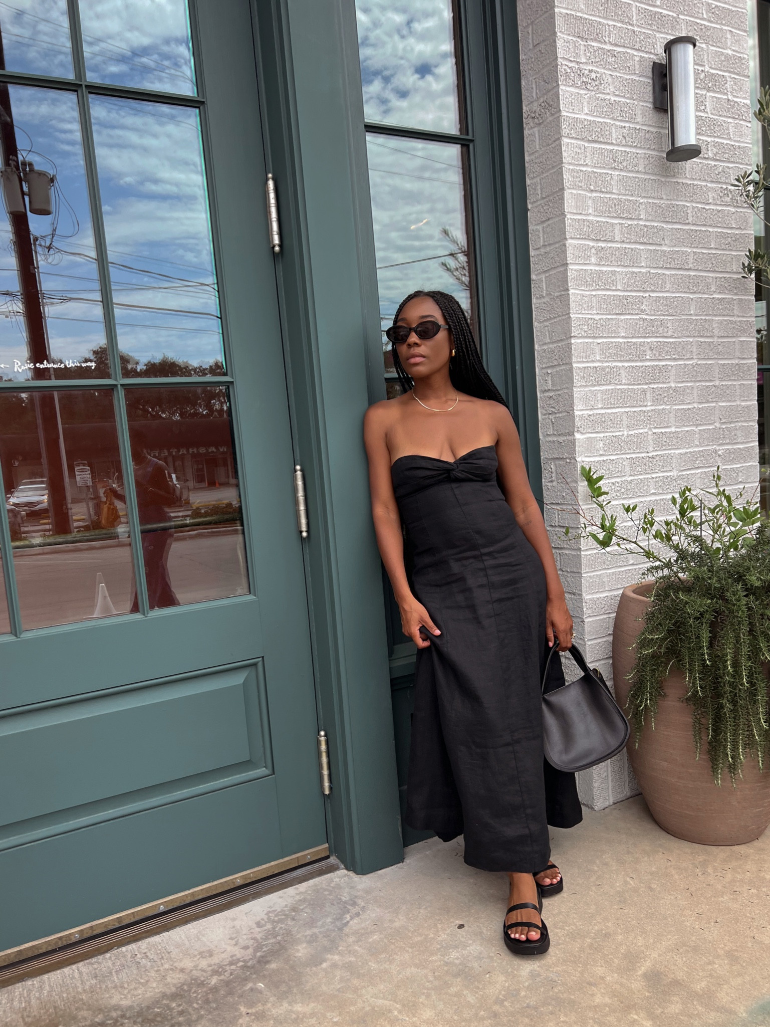 Summer casual outfit: Black tube top maxi dress, black sandals, black leather purse

#LTKitbag #LTKshoecrush #LTKstyletip