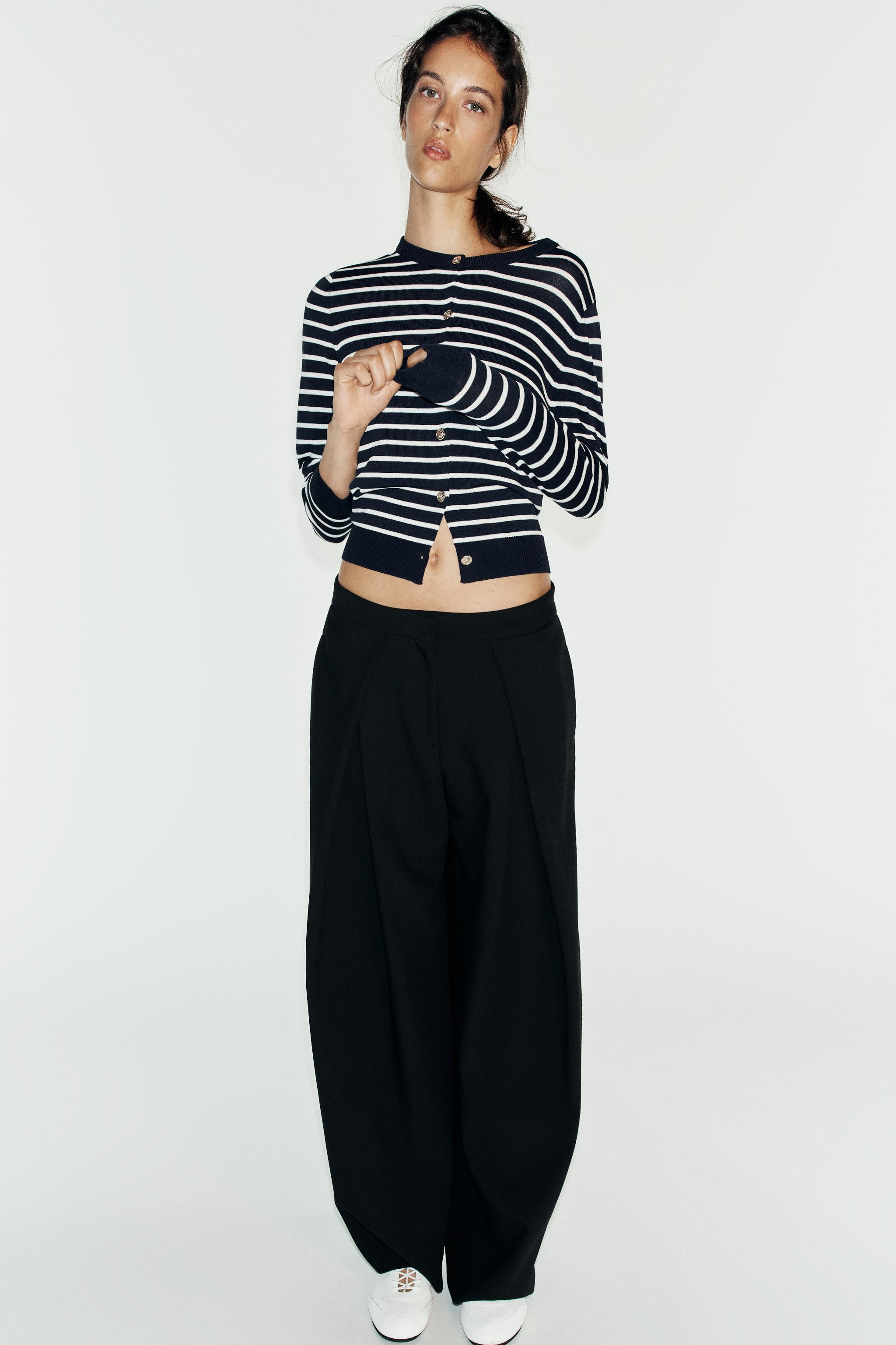 Model height: 183 cmRound neck long sleeve cardigan. Front button closure. | Zara US