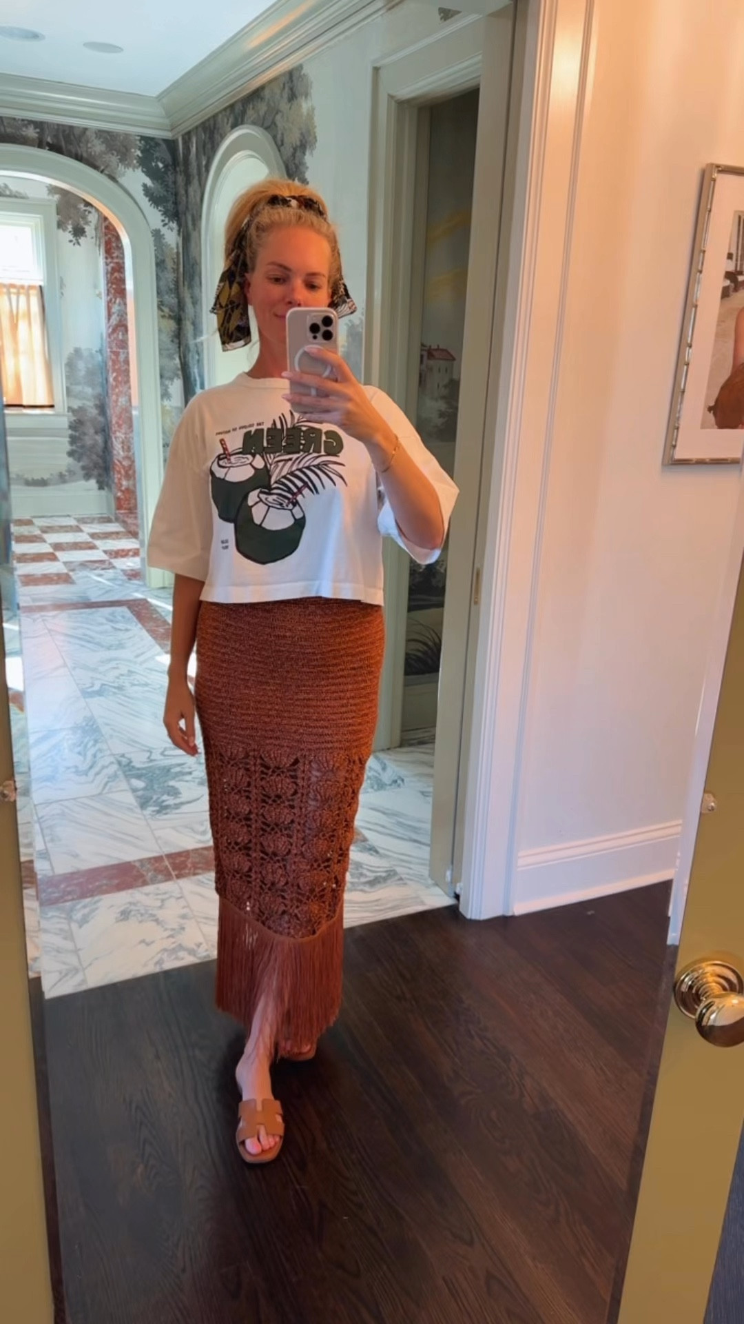 Fun vacation outfit styled with a macrame skirt (that 50% off!), cropped tee, flat sandal, and silk scarf tied around my hair 