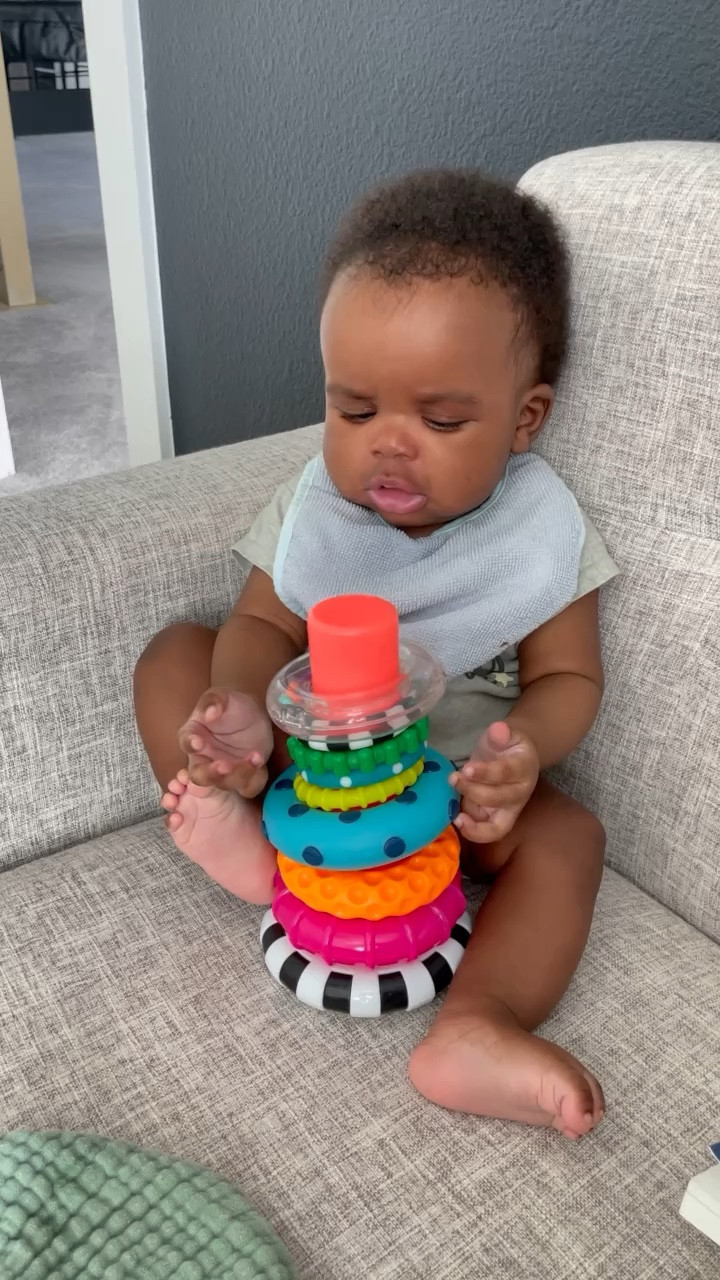 Love this toy. He can play with the rings individually or practice taking them on and off the stand.