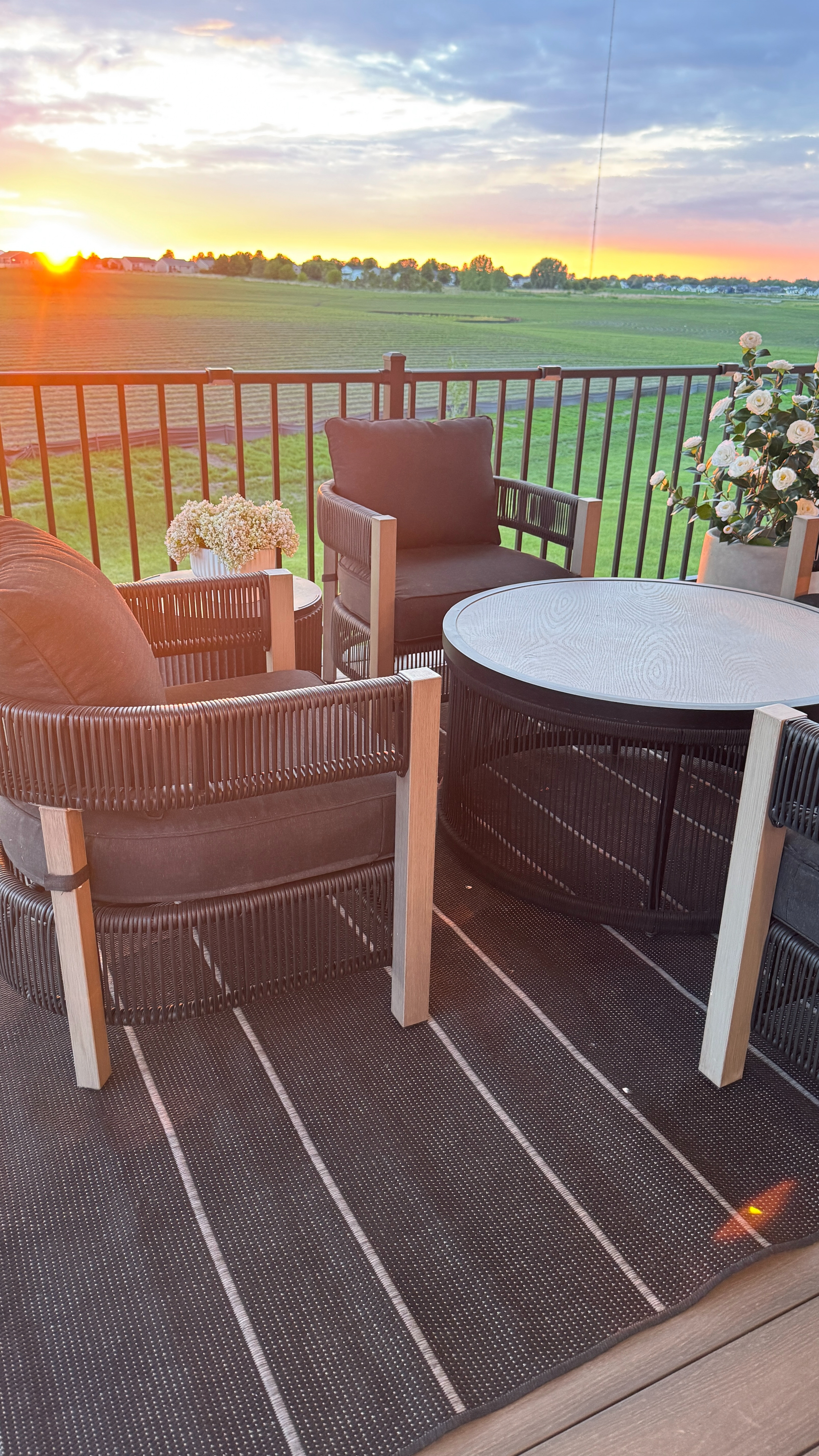 Loving my Walmart patio set 🤍 It’s such a good mix of comfort and style for outdoor lounging, especially paired with a rug, a side table with a cooler, a planter, and a faux floral tree to complete the space. 

 #LTKSeasonal #LTKHome