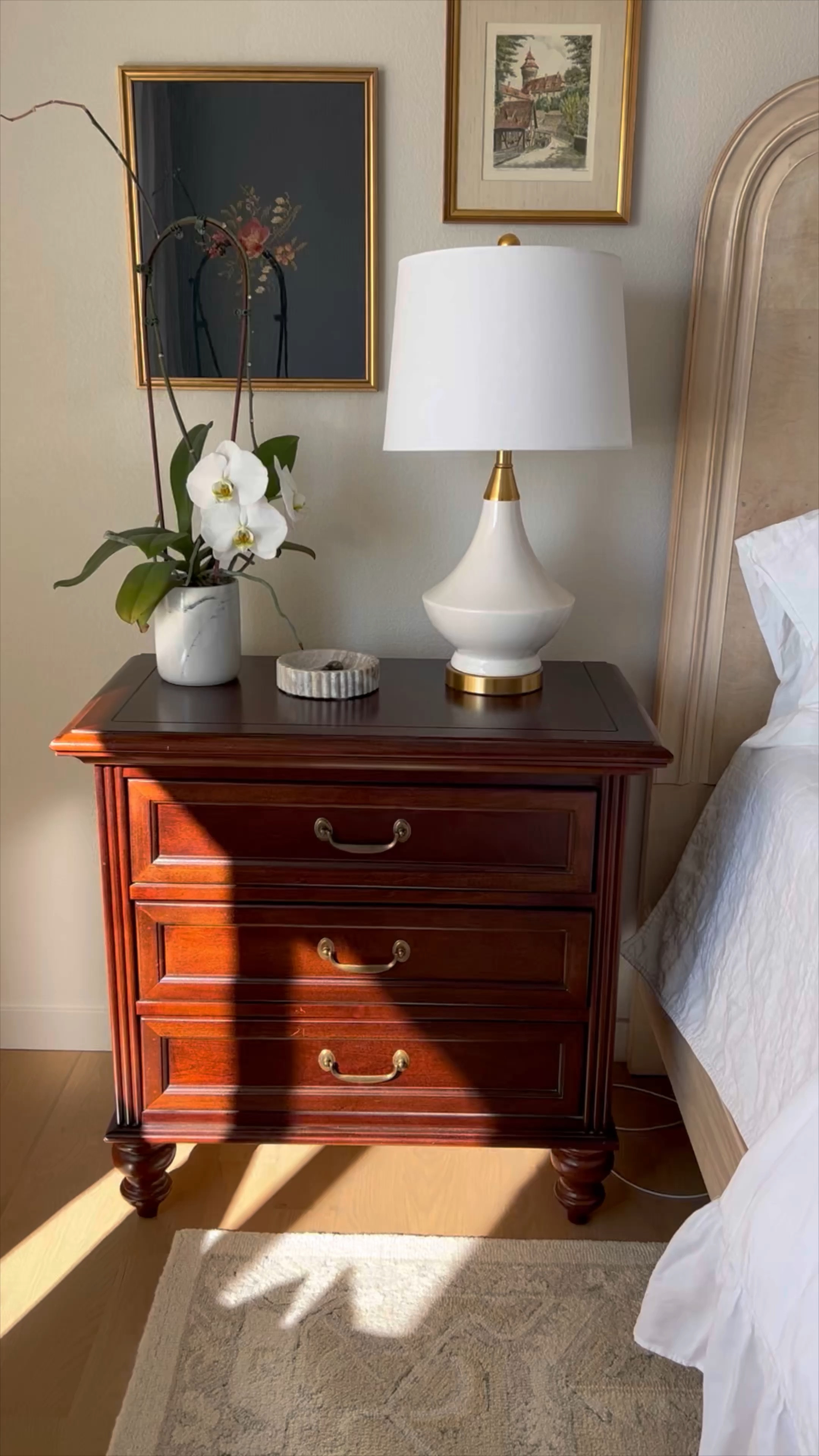 Easy wall plug hack! Scoot your furniture flush to the wall using this slim profile plug. 

Primary suite, nightstand, white table lamp, orchid, bedroom, gold frame

#LTKhome