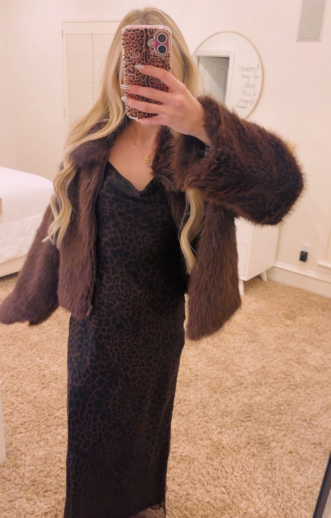 i’m wearing a size m in fur coat and a size 0 in the dress!