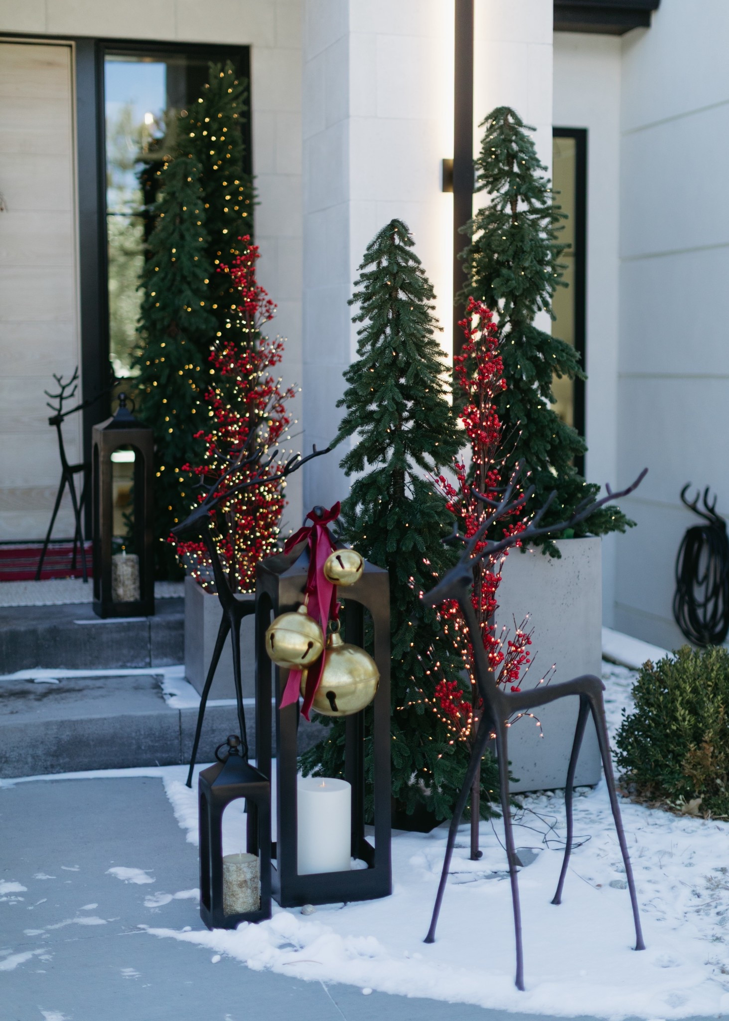 The bronze reindeer are one of my favorite additions this year. They come in so many different sizes and they look great styled indoor or outdoor. Christmas front porch details linked.

#LTKSeasonal #LTKHoliday #LTKHome