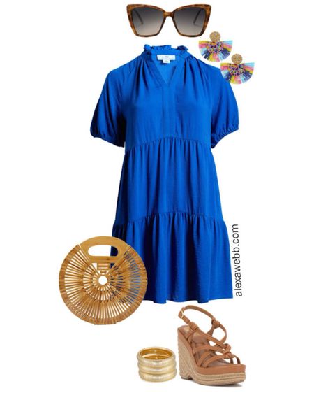 Plus Size Summer Dresses 5 - An easy casual summer outfit with a bright blue tiered dress, statement earrings, and a bamboo clutch bag. Alexa Webb

#LTKPlusSize #LTKSeasonal #LTKStyleTip