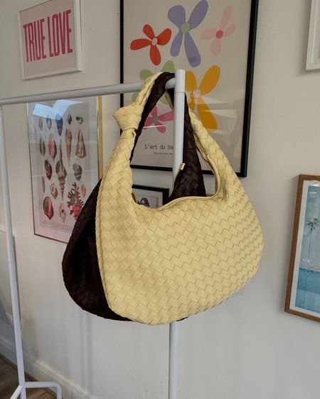 Our IT bag of the season, the Anthropologie woven shoulder bag that fits everything! We have the butter yellow and the chocolate brown. 

#LTKstyletip #LTKGiftGuide