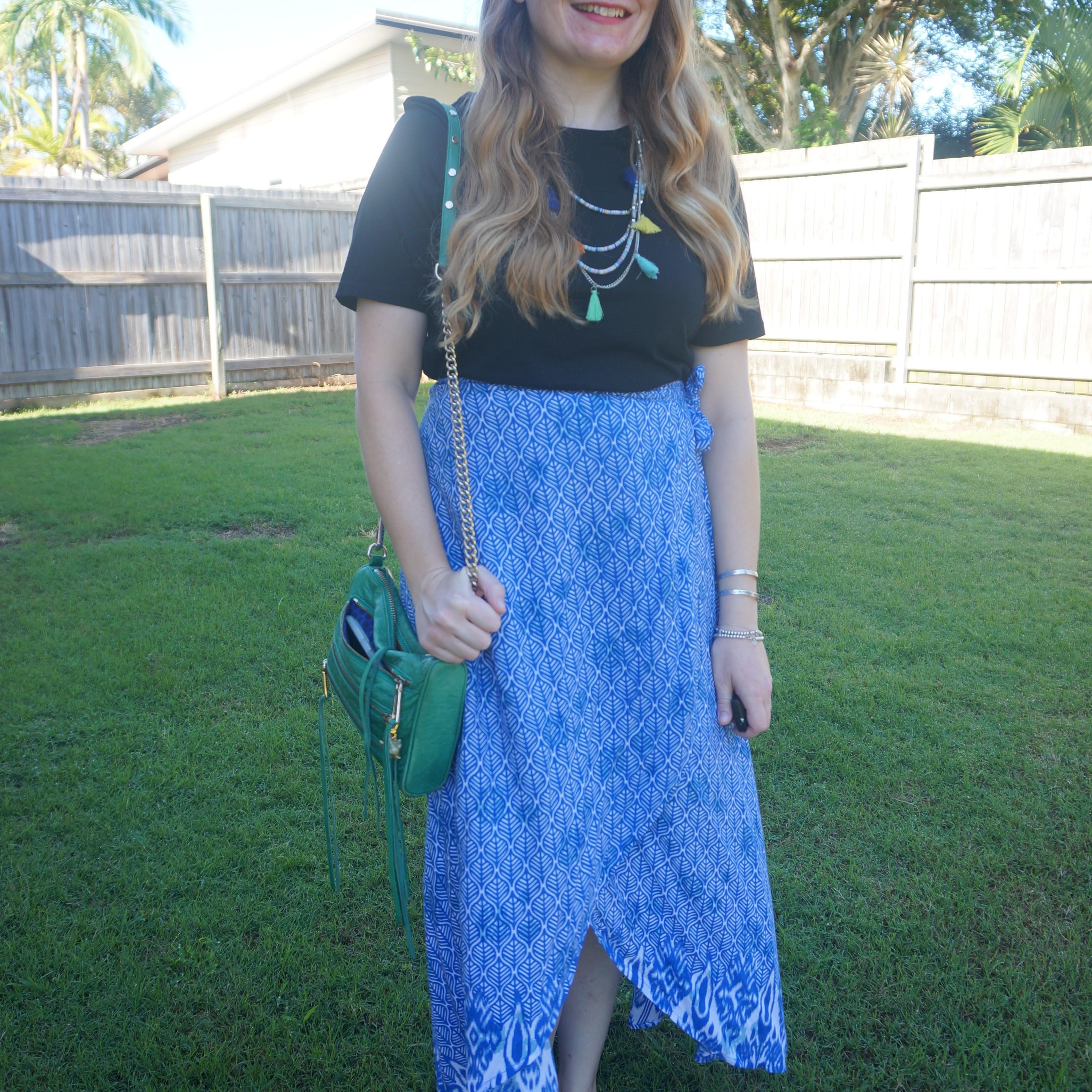 Thrifted blue wrap skirt with black tee and green Rebecca Minkoff mini 5-zip bag 💙💚

#LTKbag #LTKaustralia #LTKsummer