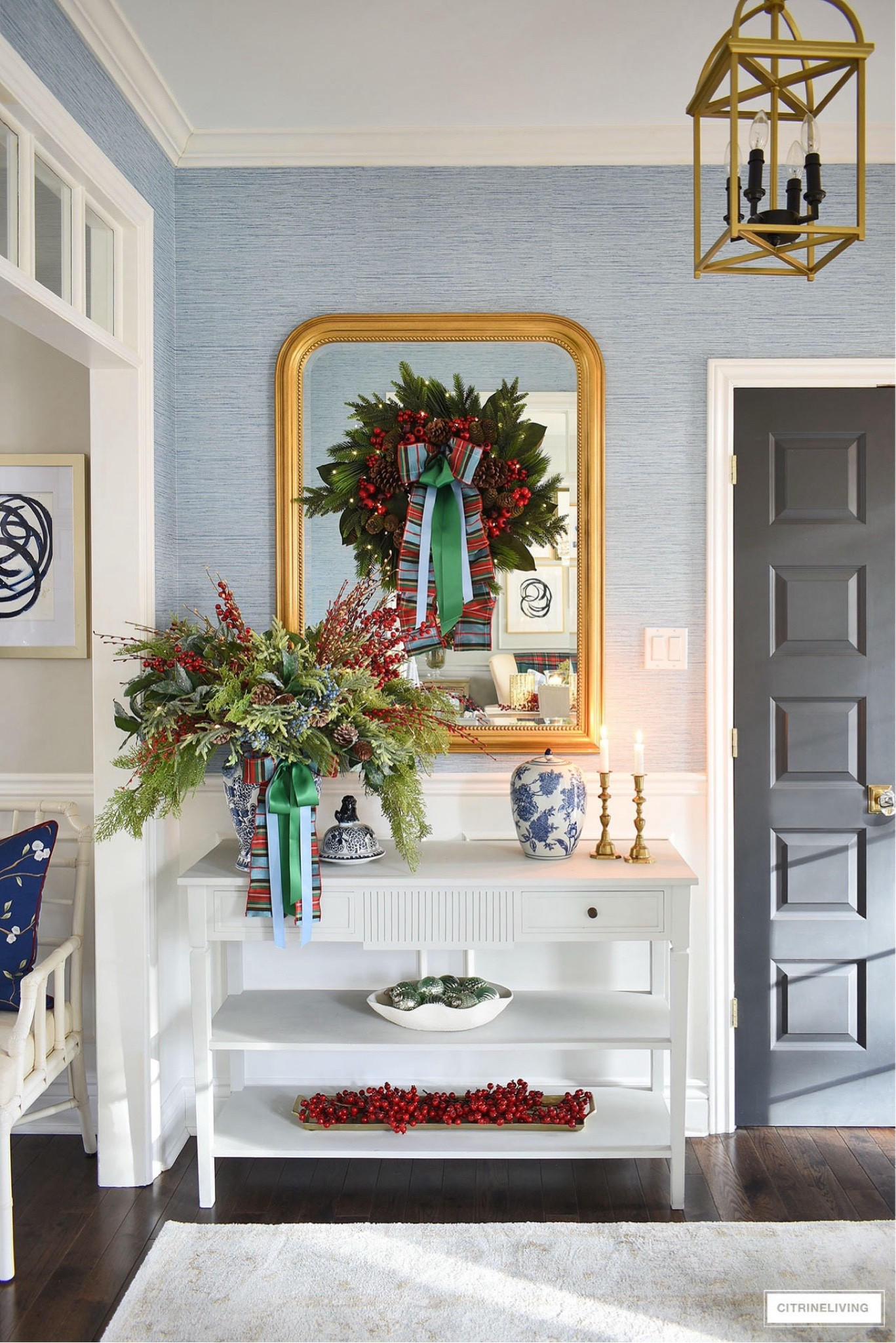 Create an elegant and traditional  Christmas entryway with lush greenery, plaid and satin ribbon and festive red berries 

Christmas decorations, holiday wreaths, festive garlands, Christmas lights, wonderland decor, holiday table setting, Christmas centerpieces, plaid ribbons, seasonal, Christmas-themed, jingle bells decor, flannel, Christmas, Santa, holiday mantelpiece, winter greenery, Christmas wreath hanger, festive. 

 #LTKHoliday #LTKSeasonal #LTKHome