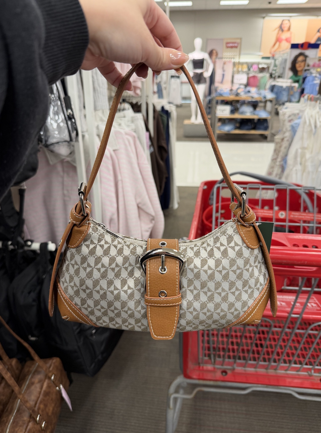 This curved buckle shoulder bag from Target looks so much more expensive than it is. The shape is really on trend right now and the buckle detail gives it that elevated, designer feel while still being super easy to wear every day. Such a good affordable bag to throw on with anything this season.

#LTKMothersDay #LTKgrwm #LTKSaleAlert