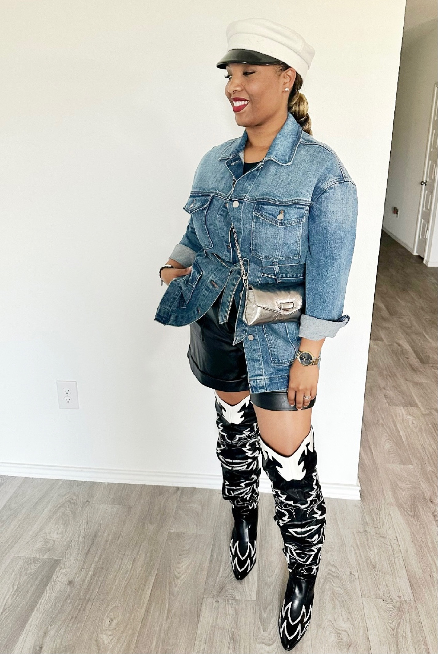 Perfect Southern girl year round outfit! Featuring a denim jacket, thigh high cowboy boots, black faux leather shorts and a Ruslan Baginsky hat! 

#LTKcurves #LTKunder100 #LTKstyletip