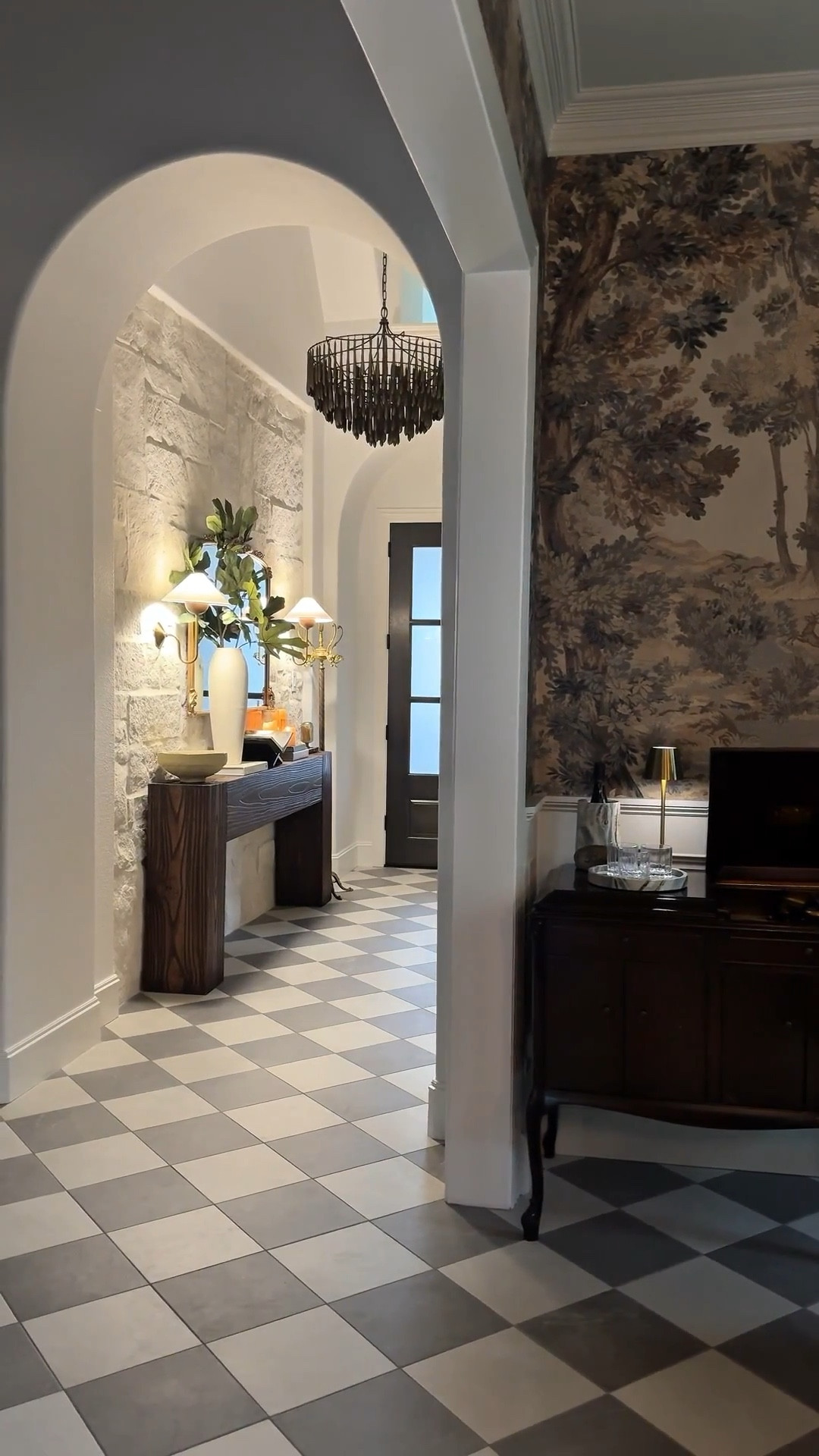 This entryway is such a reminder that you really do have to trust the process 🤍
When we first moved in, this narrow hallway honestly had me totally stuck. I couldn’t picture how to style it in a way that felt elevated and intentional, and I was convinced it was just a space I’d never love. But once I started designing it, everything finally clicked—and now it’s one of my favorite moments in the house.

A huge part of what pulled it all together was our Vienna console table. I ordered it in the rich walnut finish so it would tie in with the deep walnut stain on our antique doors across from it, and I loved that it was semi-customizable. It comes in different widths, heights, and styles, which was key for a narrow entry like this. Most consoles are way too wide, and the slim ones are usually not cute… but this one is beautifully made and fits the space perfectly.

I’m officially obsessed with how this little hallway turned out.

#LTKHome #LTKFindsUnder100 #LTKdayinmylife