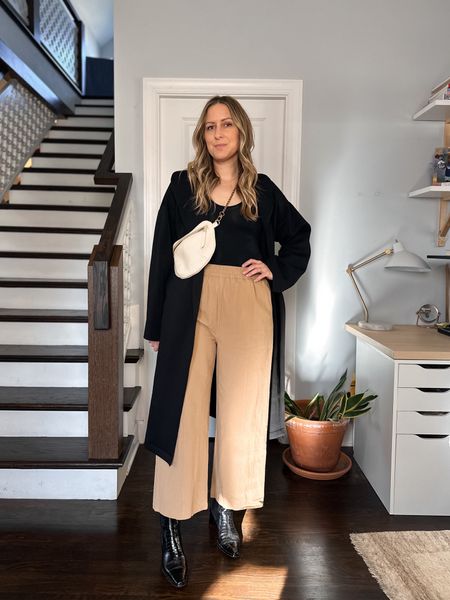 Coat is tts and from Léze the Label, code: MICHELLETOMCZAK for 15% off. Tee is from Numi. Pants: tts, code: MICHELLETOMCZAK15 for 15% off your first order. Boots: old from Frēda Salvador. Bag + Strap: code: MICHELLE15 for 15% off your first order  

#LTKitbag #LTKworkwear #LTKstyletip