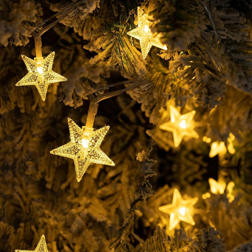 Holiday Essence Essence Star String Lights 100 LED Warm White Star Fairy Lights for Bedroom Party Wedding Xmas Light Decorations 49 Ft Waterproof Plug in for Indoor Outdoor 8 Modes Christmas Lights | Amazon (US)