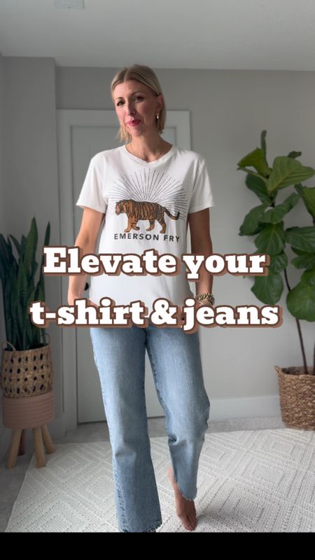 Update your basic T-shirt and jeans this spring with elevated silver sneakers, a classic, trenchcoat, a handbag and sunglasses!

I am wearing a small in this oversized tee, size 6 in the straight leg jeans (they run snug & are 100% cotton, I’d go up one size for a relaxed fit!) 
Size medium in the trench coat

#LTKstyletip #LTKover40 #LTKVideo