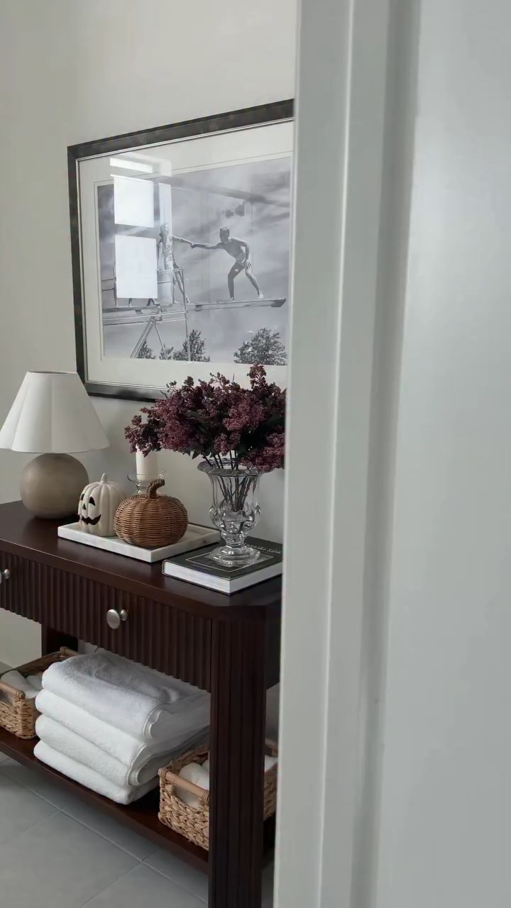 a few little touches make the bathroom feel so cozy ✨#bathroom #consoletable #consoletablestyling #aesthetic #pintrestaesthetic