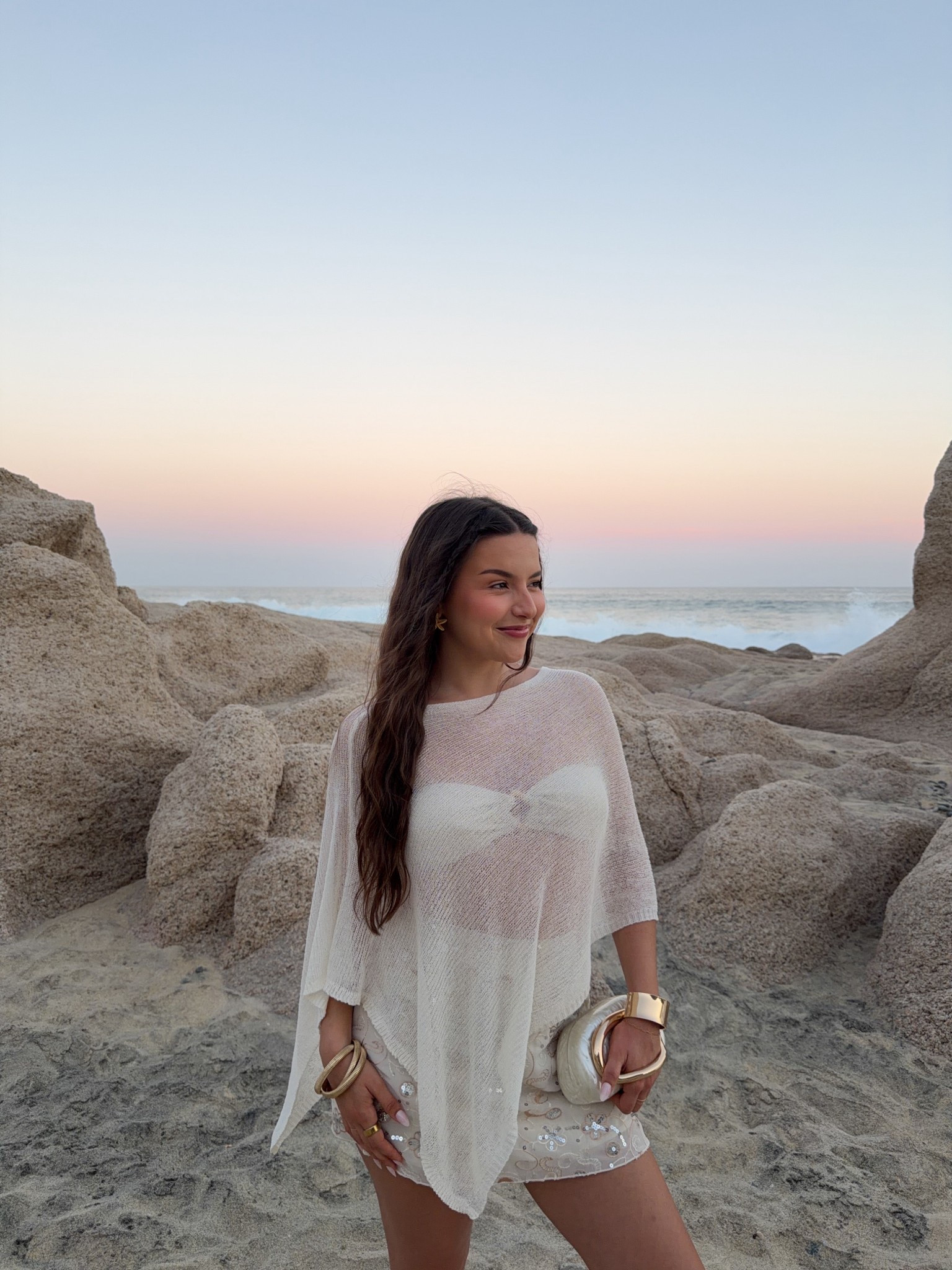 Dinner on vacation!! Loving this outfit sm 🐚✨ The poncho & skirt are from Amazon, swimsuit top is from TJ Swim, and bag is Windsor 

Vacation outfits beach, Cabo, resort wear 

#LTKootd #LTKTravel