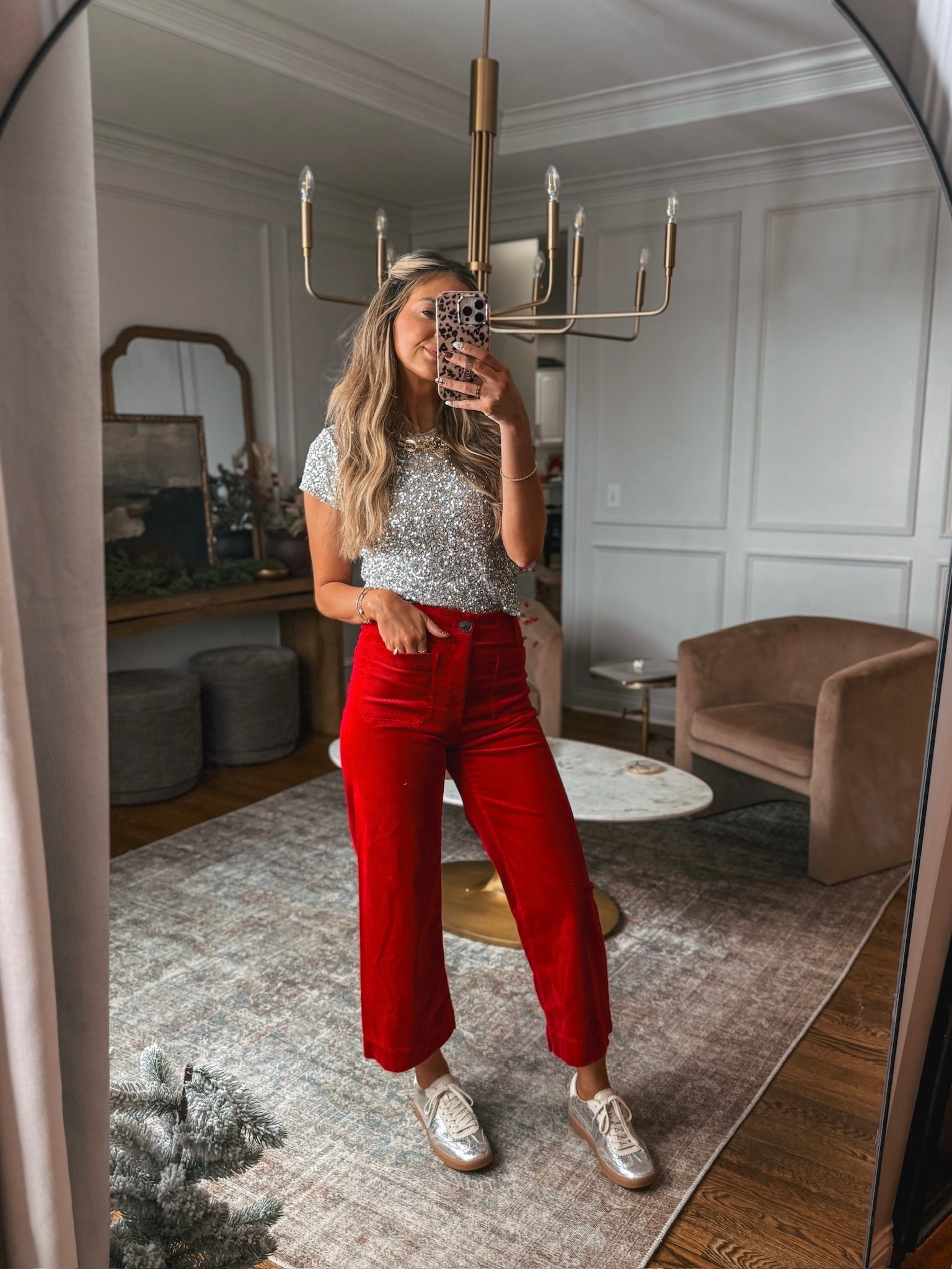 The viral Colette pants in a beautiful red corduroy with this sequin top is perfect for your holiday party outfit! I wore this look with these super cute and comfy metallic sneakers but you could dress it up with heels and a blazer too! I’m wearing a 27 regular length in the pants and a small in the top. Use code OLIVIAC30 for 30% off and if you spend $200 you get a $50 gift card to use 12/11-12/25!

#LTKCyberWeek #LTKSaleAlert #LTKHoliday