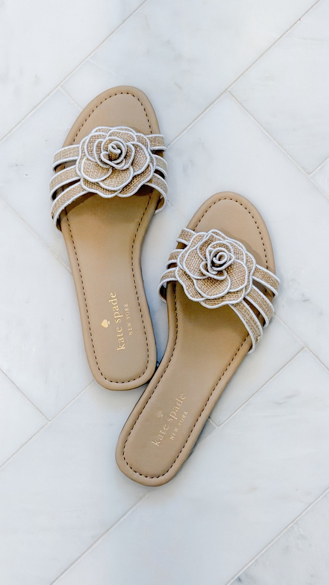 Can’t get over how darling the flower & rattan detail is on these little slide sandals which are on sale & perfect for this spring & summer. They also come in black leather or if you love the natural color with the white edge detail they also have a heeled espadrille in that color too. 

#LTKSpringSale #LTKSeasonal #LTKSaleAlert