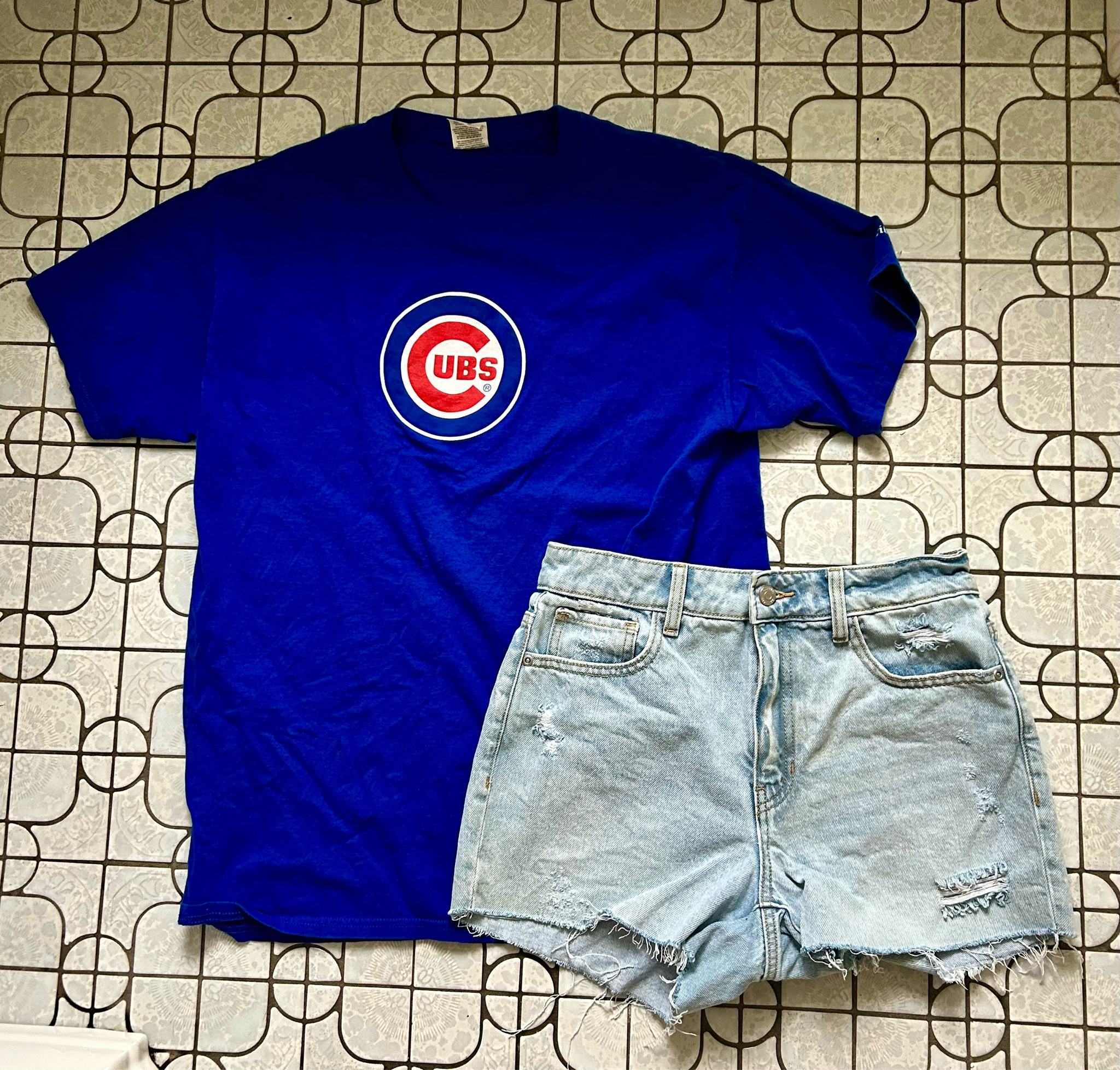 Chicago Cubs baseball game outfit with Jean shorts + an oversized Chicago cubs shirt, perfect for a day out at the baseball game

#LTKSeasonal #LTKTravel #LTKStyleTip