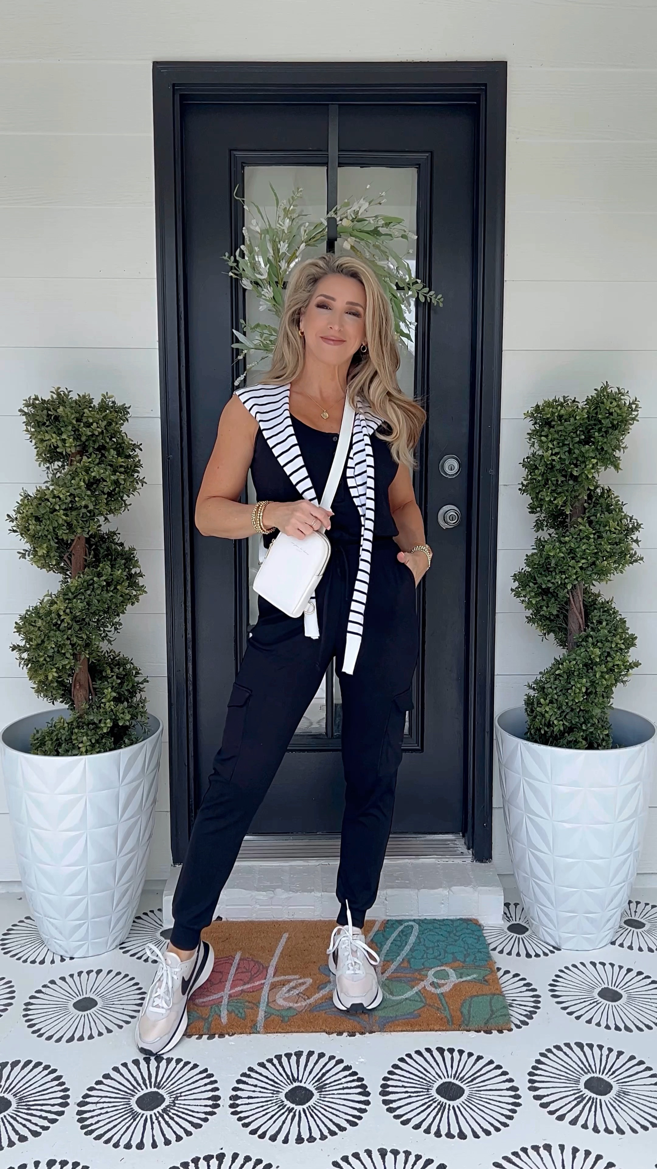 Spring summer black sleeveless jogger jumpsuit, vacation outfits, travel outfit, Amazon neutral crossbody bag, nude sandals mules, charcoal black cardigan with pockets, sunnies, sunglasses, sand neutral moto jacket blazer 

#LTKstyletip #LTKtravel #LTKVideo