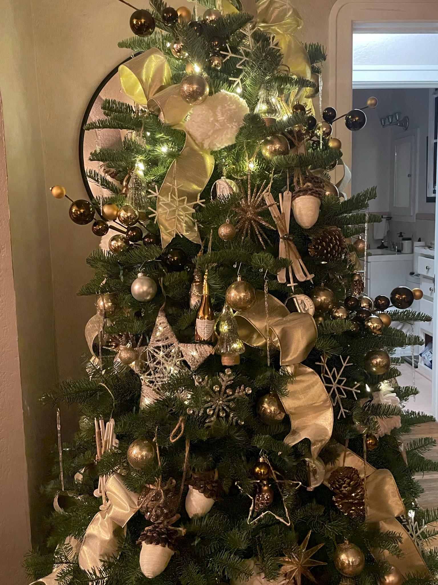This beautiful real Christmas tree is filled with Pottery Barn ornaments. It’s classic and beautiful  

#LTKHoliday #LTKhome #LTKSeasonal