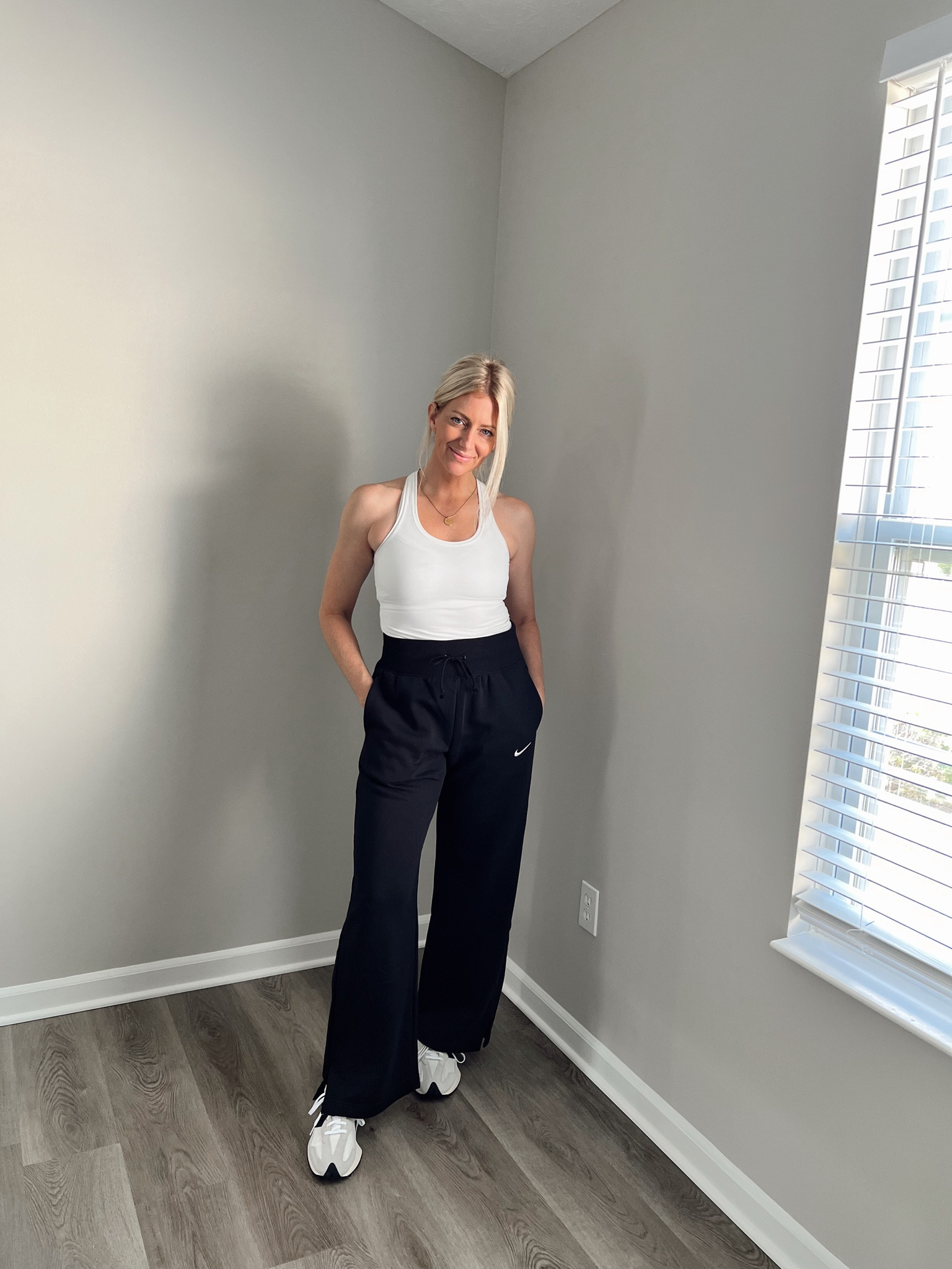The slits on the sides of these sweatpants paired with the high waist band is 👌🏼👌🏼

Oversized 
High waisted 
Nike
Lululemon nulu tank
New balance 327 sneakers
Electric picks 
Gold necklace 
Summer to fall look
Work from home & running errands outfit 
Casual athleisure 

#LTKstyletip #LTKshoecrush #LTKfindsunder100