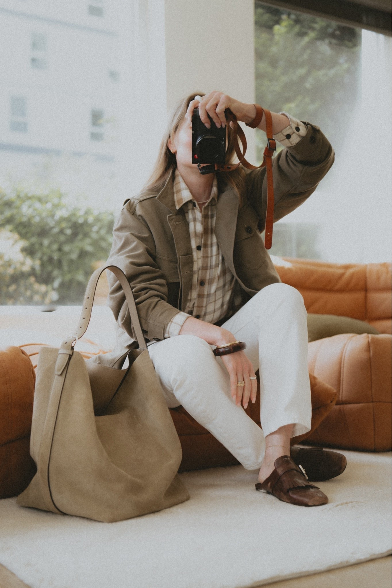 OOTD: Prada mules + @Levi's 501 white jeans + L.L. Bean flannel shirt + Buck Mason Soft Olive all day field jacket + Toteme belted tote in suede.

#LTKWorkwear #LTKSeasonal #LTKootd