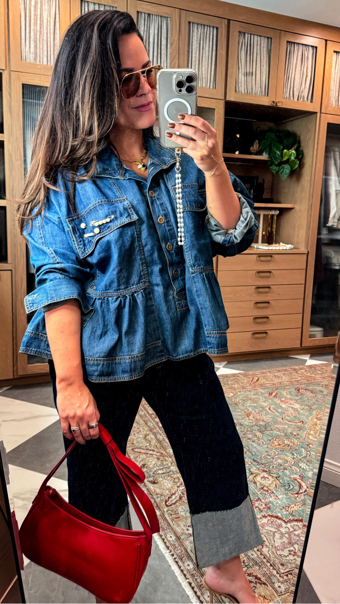 Midsize fall denim on denim outfit 
I am so obsessed with this denim top! It runs oversized- I sized down to a large! 
Cropped and cuffed dark wash jeans! So comfy and great stretch! I got a size 33 for a looser fit, also a petite (I am 5’6) 
Red bow bag
Amazon brooches 

#LTKFallSale #LTKMidsize #LTKCon